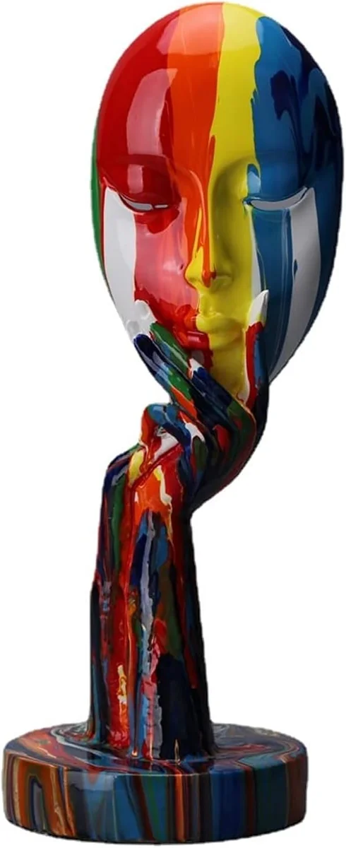 Nearly 12-inch abstract resin statue of a stylized female face resting her chin on her hand in a thinker pose, painted in bold multicolor stripes of pink, orange, yellow, green, blue and purple, mounted on a small base as a decorative ornament