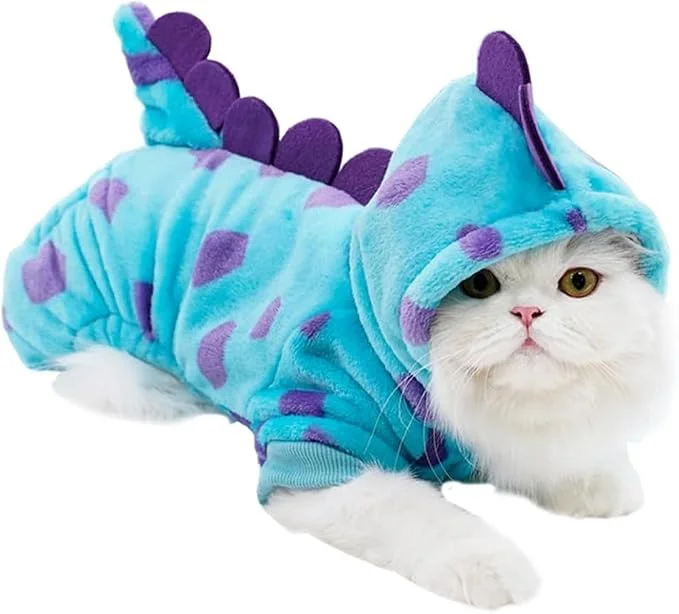 Small dog wearing a soft flannel dinosaur jumpsuit with hood